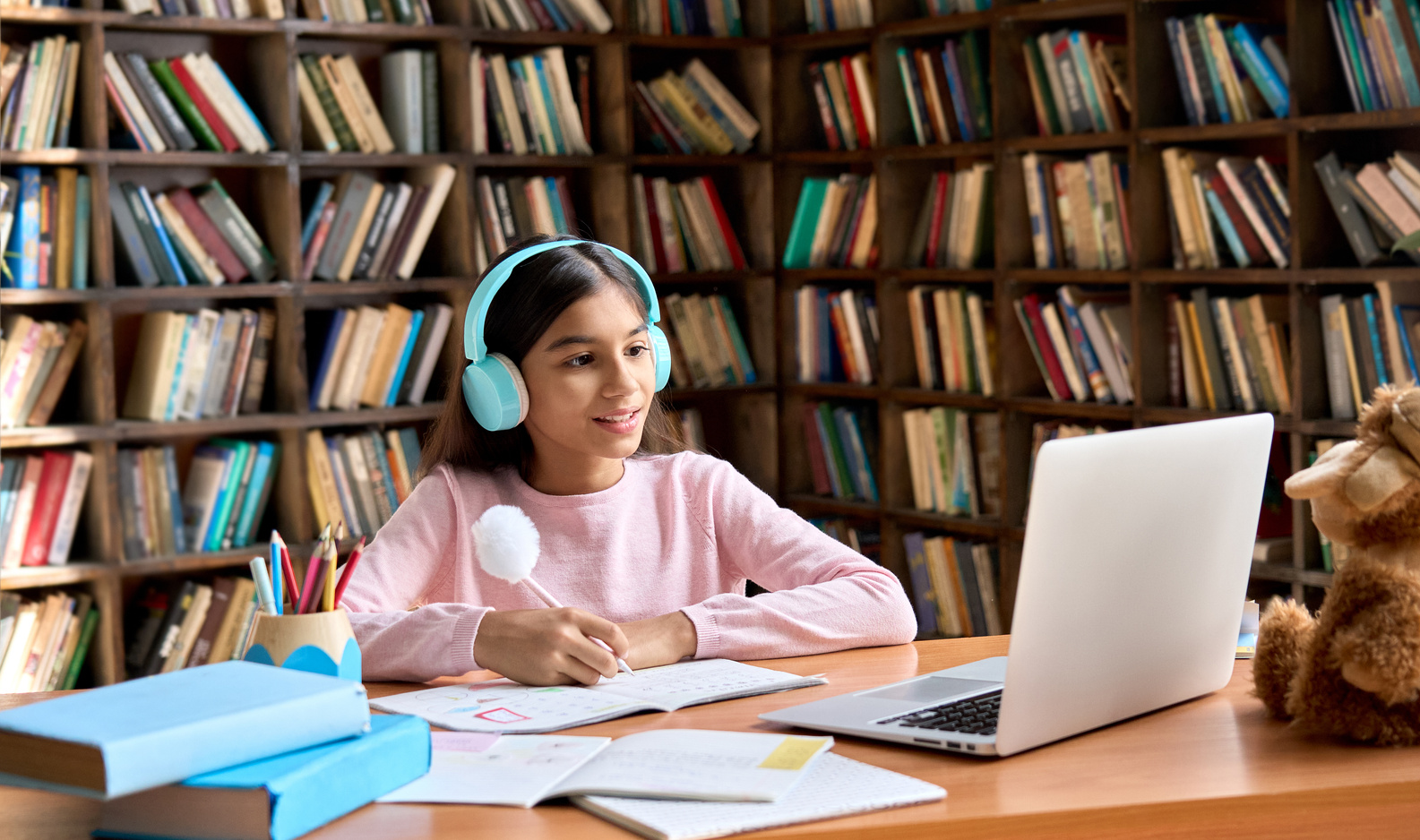 Young Female Student Having Online Class on Laptop